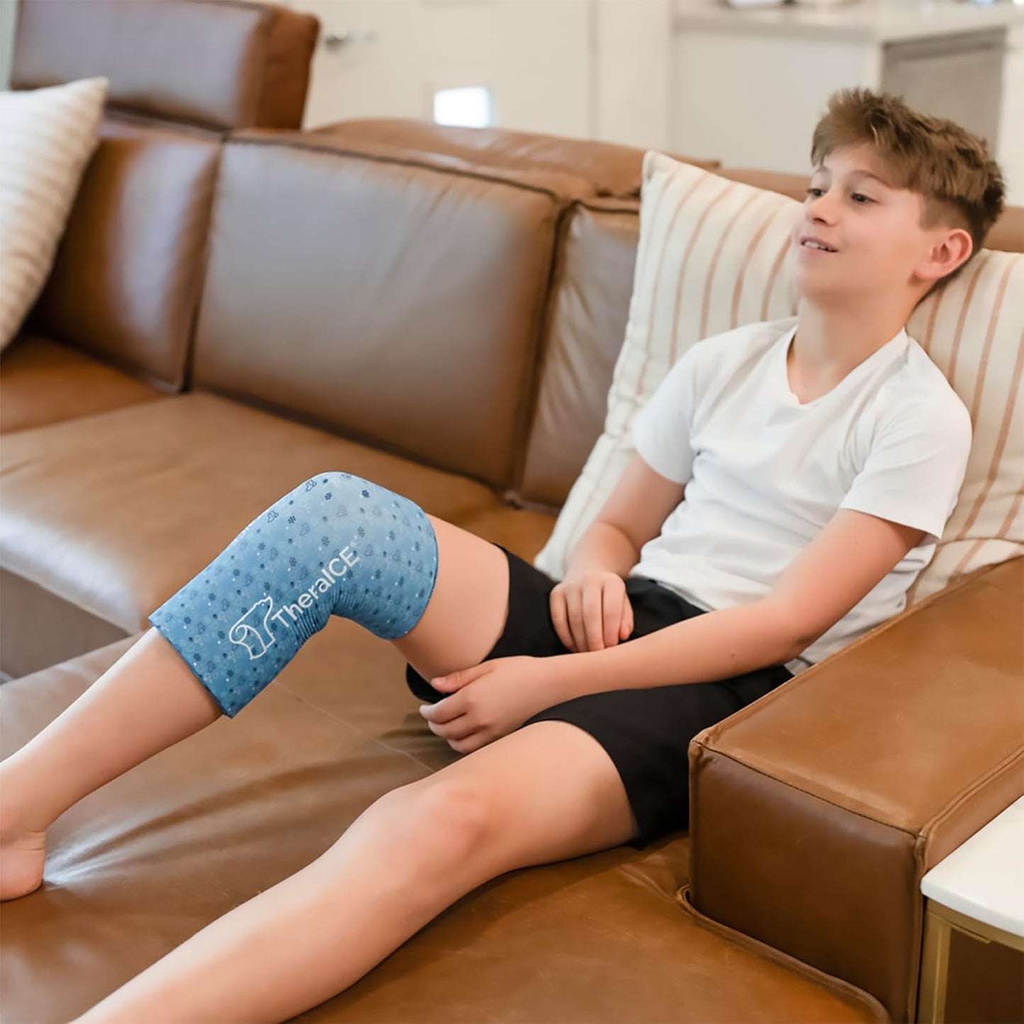 TheraICE Junior Knee Ice Pack Wrap Compression Sleeve for Injuries, Reusable Gel Cold Packs Brace Also for Ankle & Calf - Flexible Cold Wrap Recovery for Meniscus, ACL, MCL Pain Relief (X-Small)