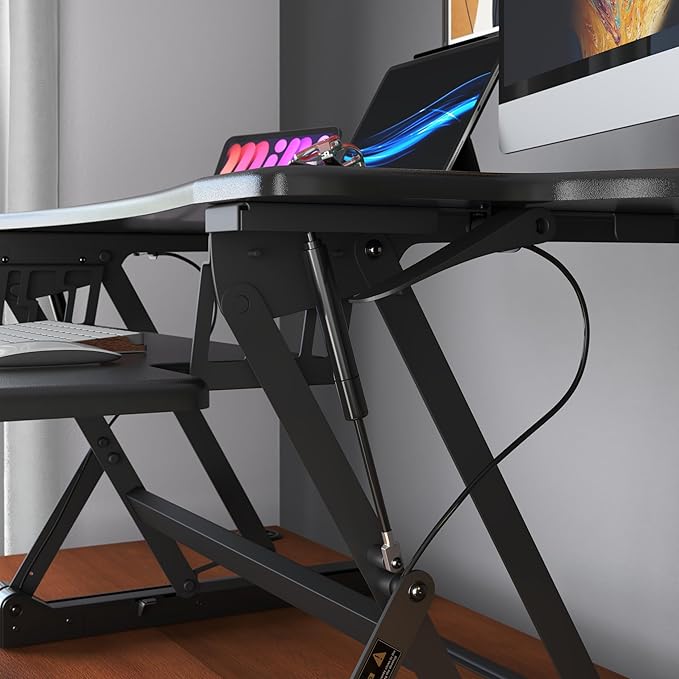 Mount-It! Standing Desk Converter, 48" Wide Sit Stand Desk Riser with Dual Gas Spring Handles, Height Adjustable from 6"–19.25", Extra Large Tabletop for 2 Monitors, Keyboard Tray & Device Slot, Black